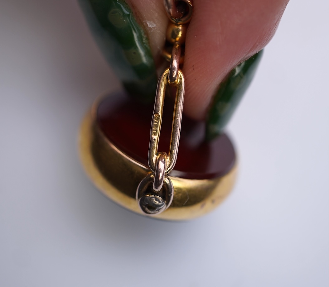 An enamel ring and a hardstone swivel fob seal
